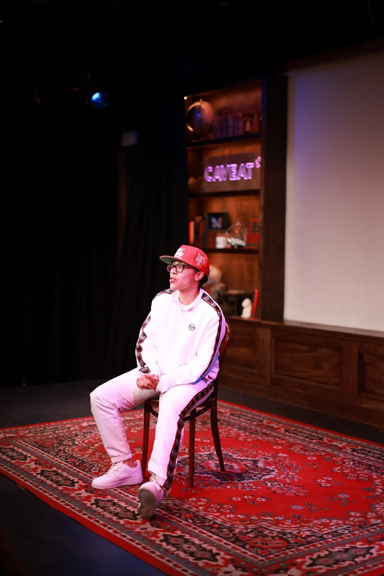 Danielle Alonzo performing a character on stage