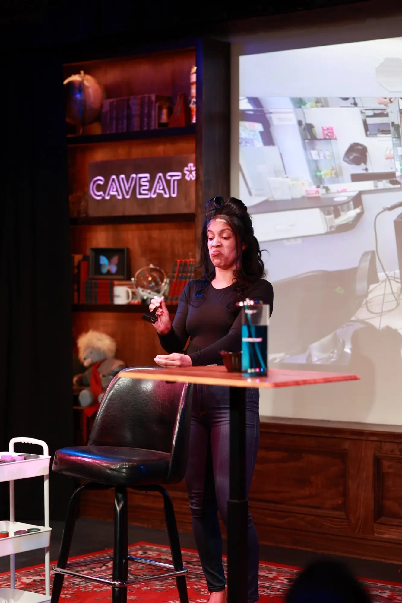 Danielle Alonzo performing a character in her one-woman show
